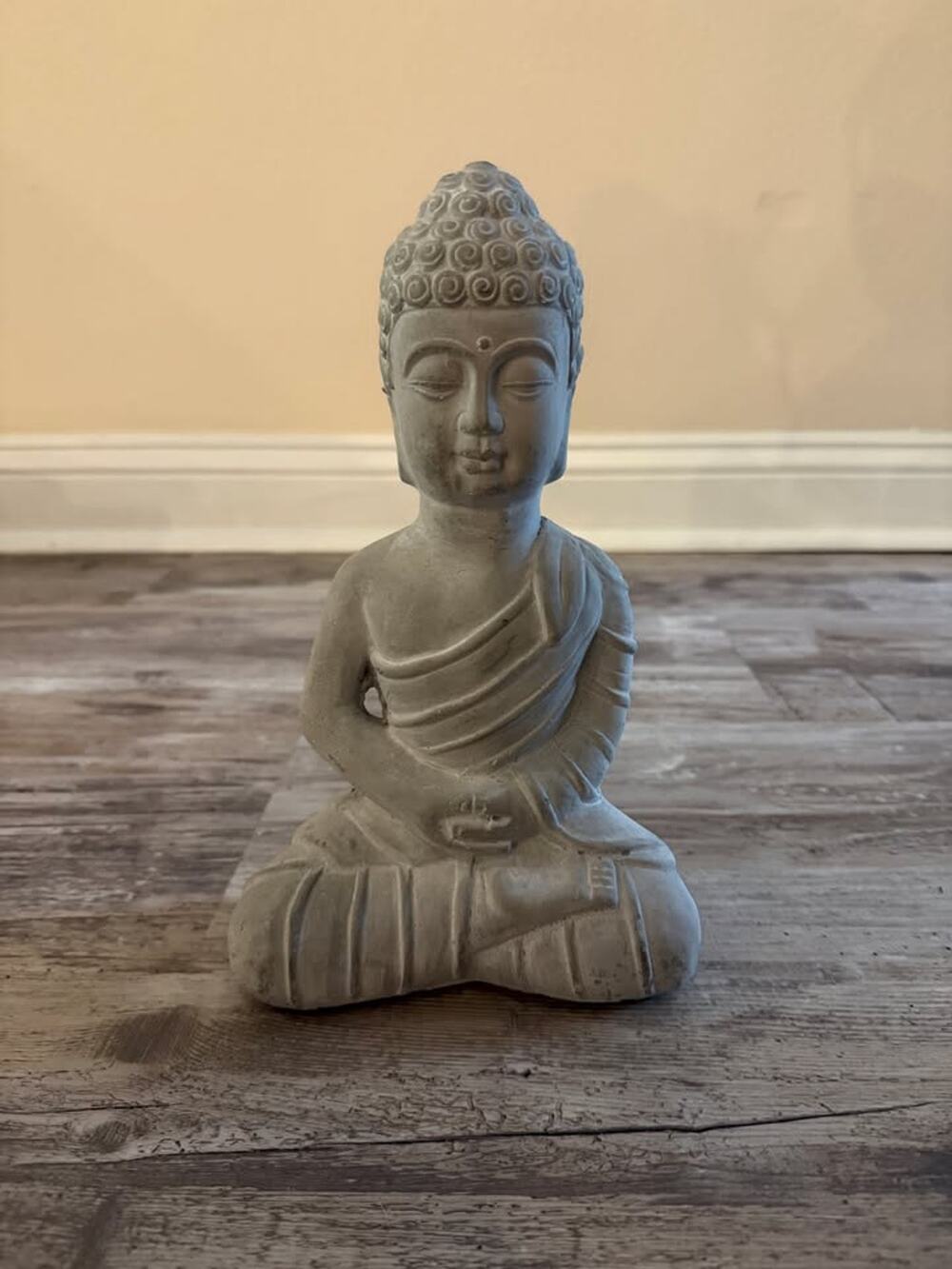 Bunch of Buddha Statues and Candles